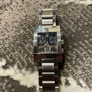 Gently used Gucci 31mm watch 7700 Chronograph. Black face.